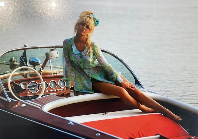 adult female person woman transportation vehicle yacht sitting beachwear clothing