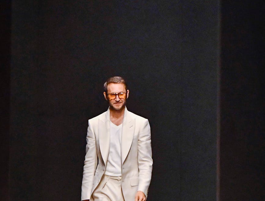 milan fashion adult male man person pants suit solo performance standing coat